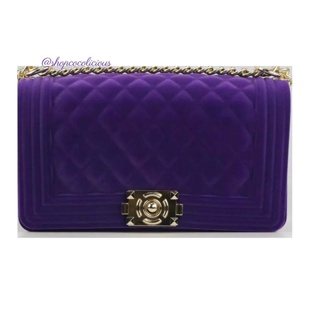 Purple velvet handbag
